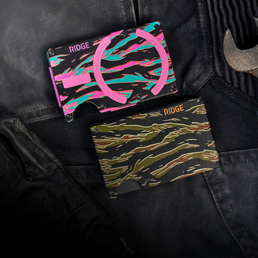 One collection. Two executions. — tiger camo wallets